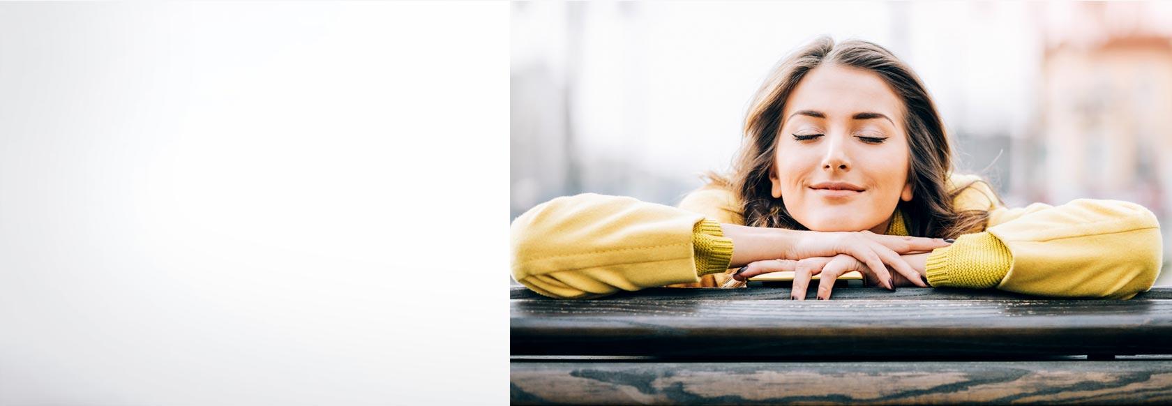 Young girl with happy and contented look on her face